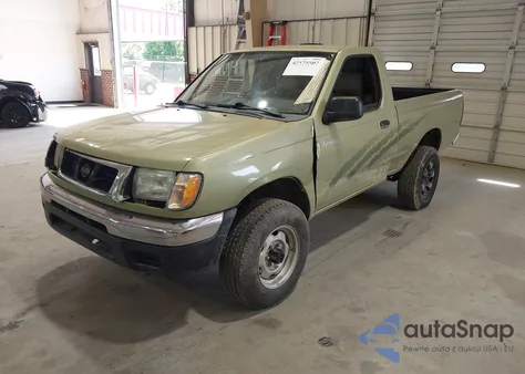 1998 Nissan Frontier Xe z USA, uszkodzony, nr VIN 1N6DD21Y6WC338111